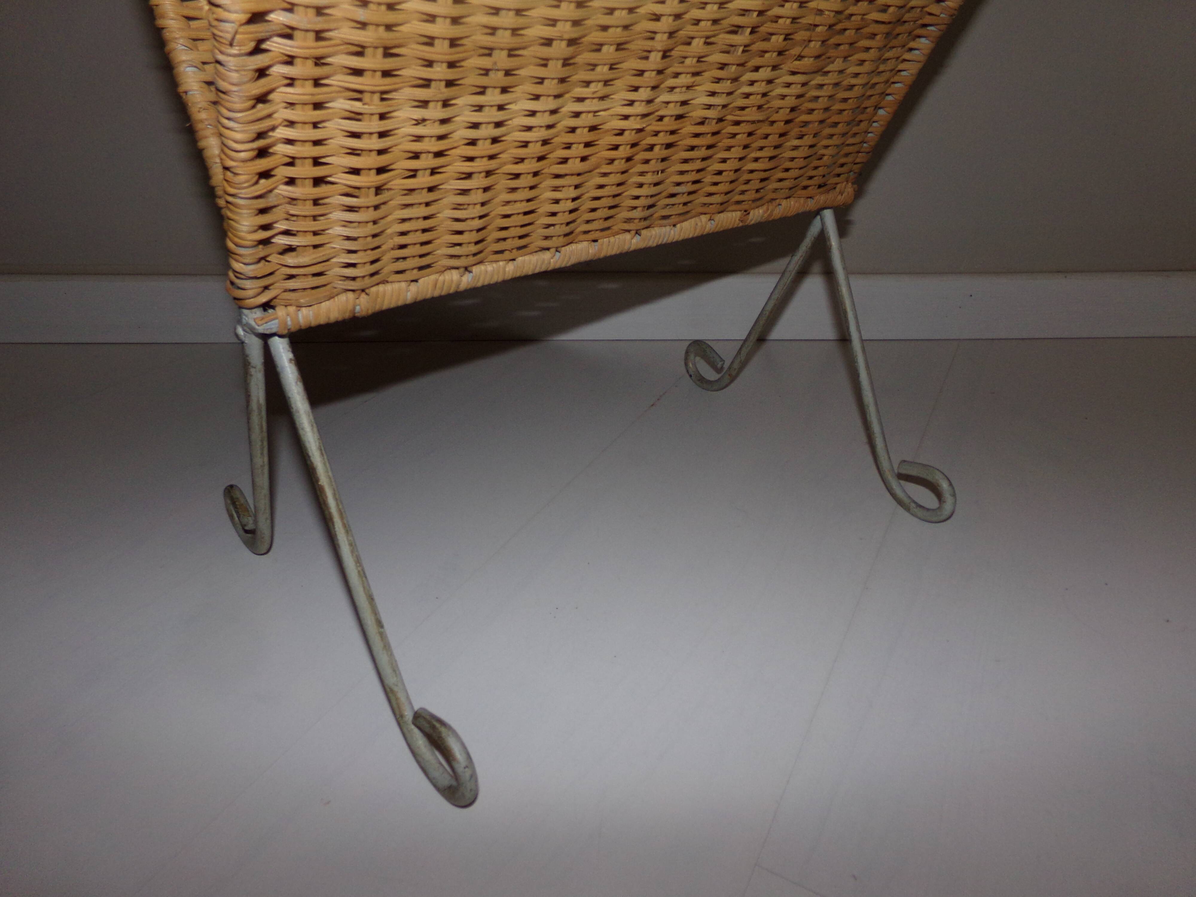 Rattan and shabby wrought iron magazine rack