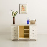 Small accent cabinet with drawers and swing doors