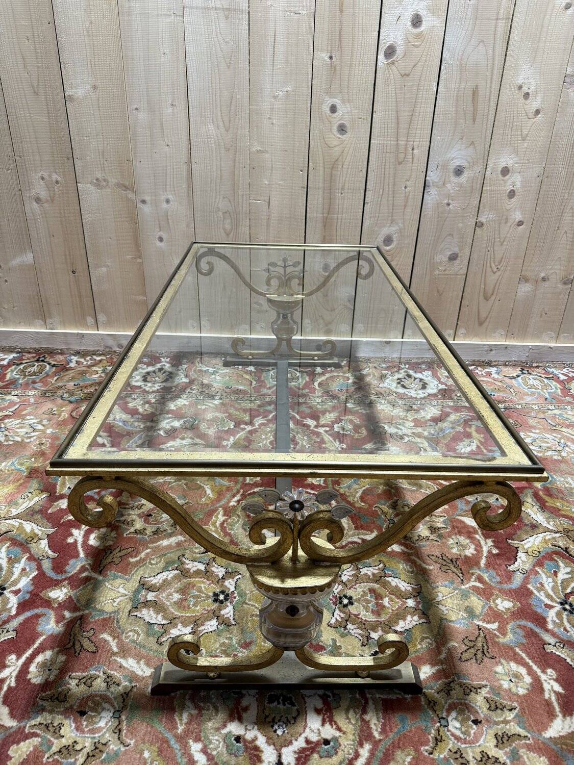 Gold metal and glass coffee table attributed to the BAGUÈS house.
