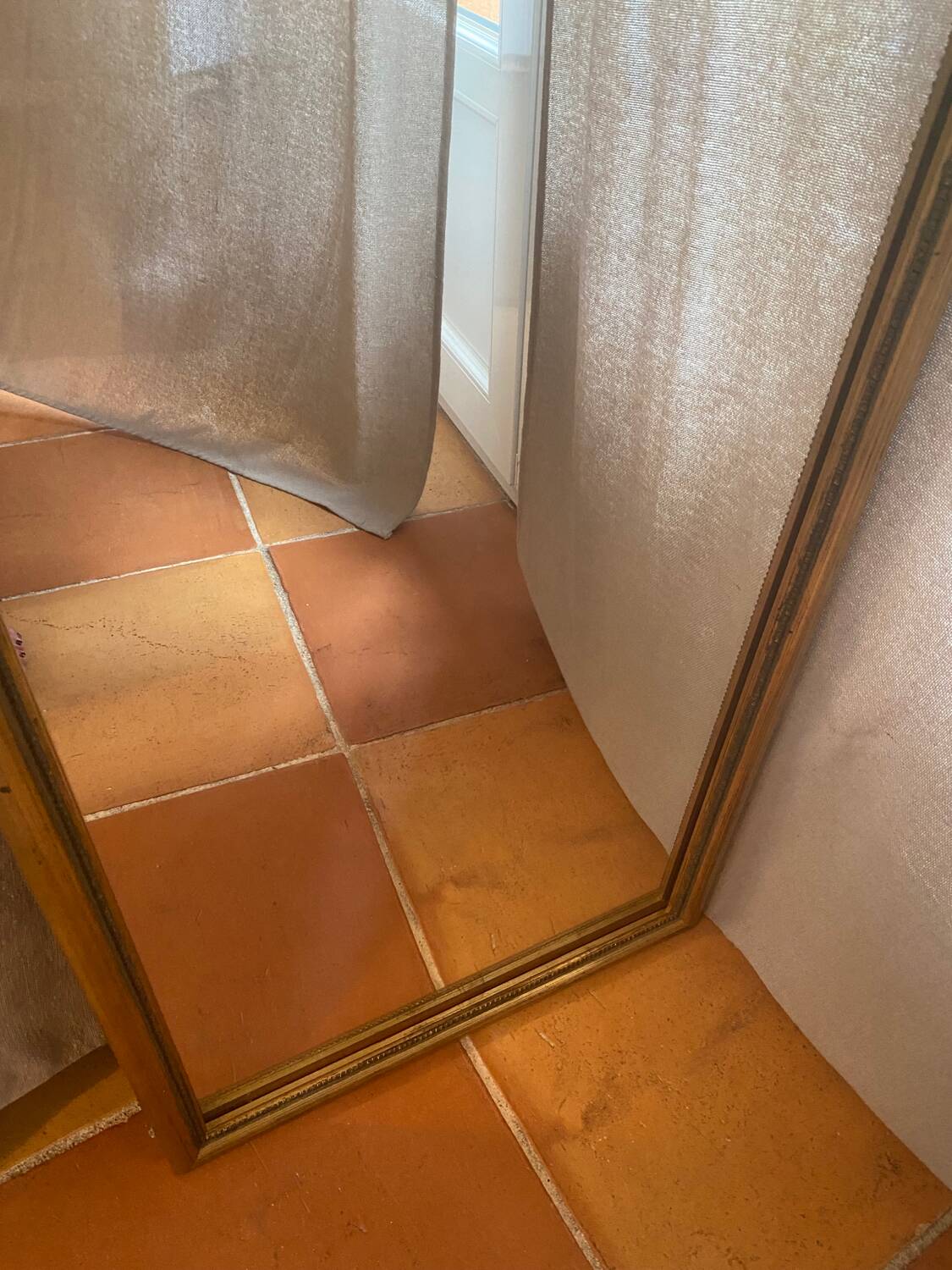 Large and old wooden mirror