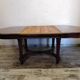 Oval wooden table with extensions