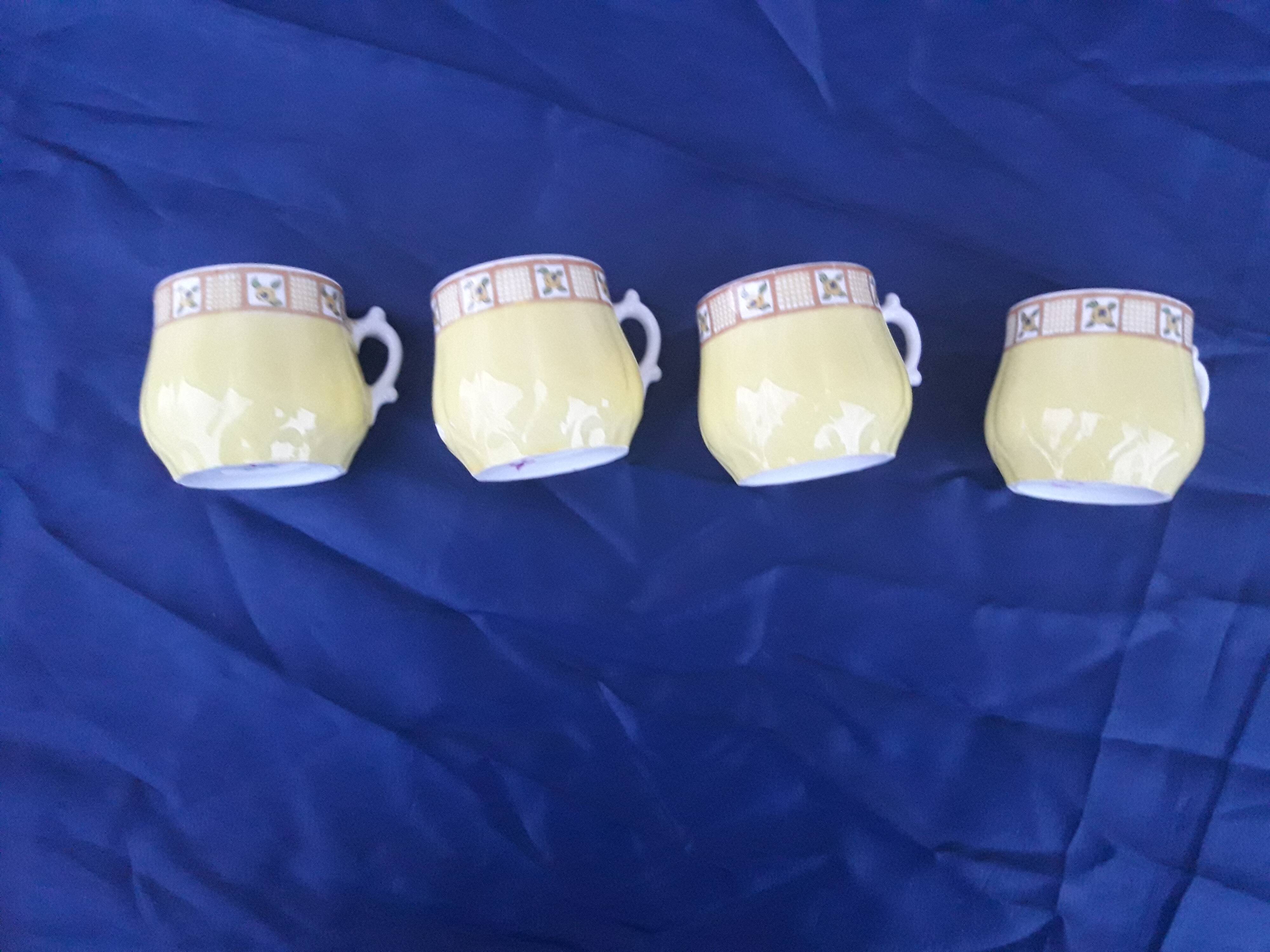 4 cups porcelain mocha service from Limoges Bernardaud and Co.