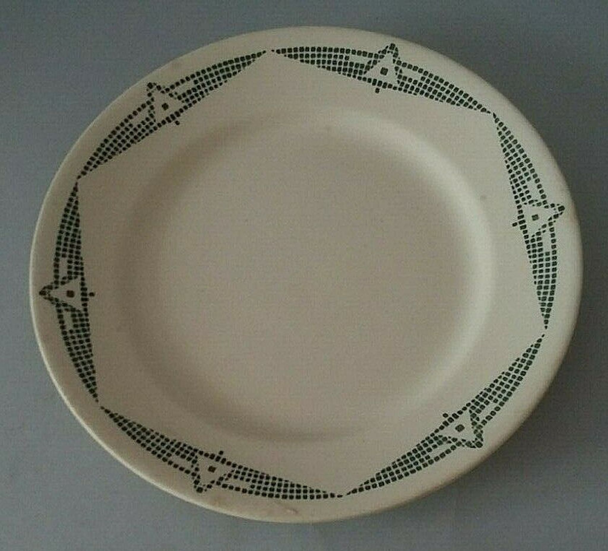Flat plate in earthenware marked PB Limoges model Henri early XXth
