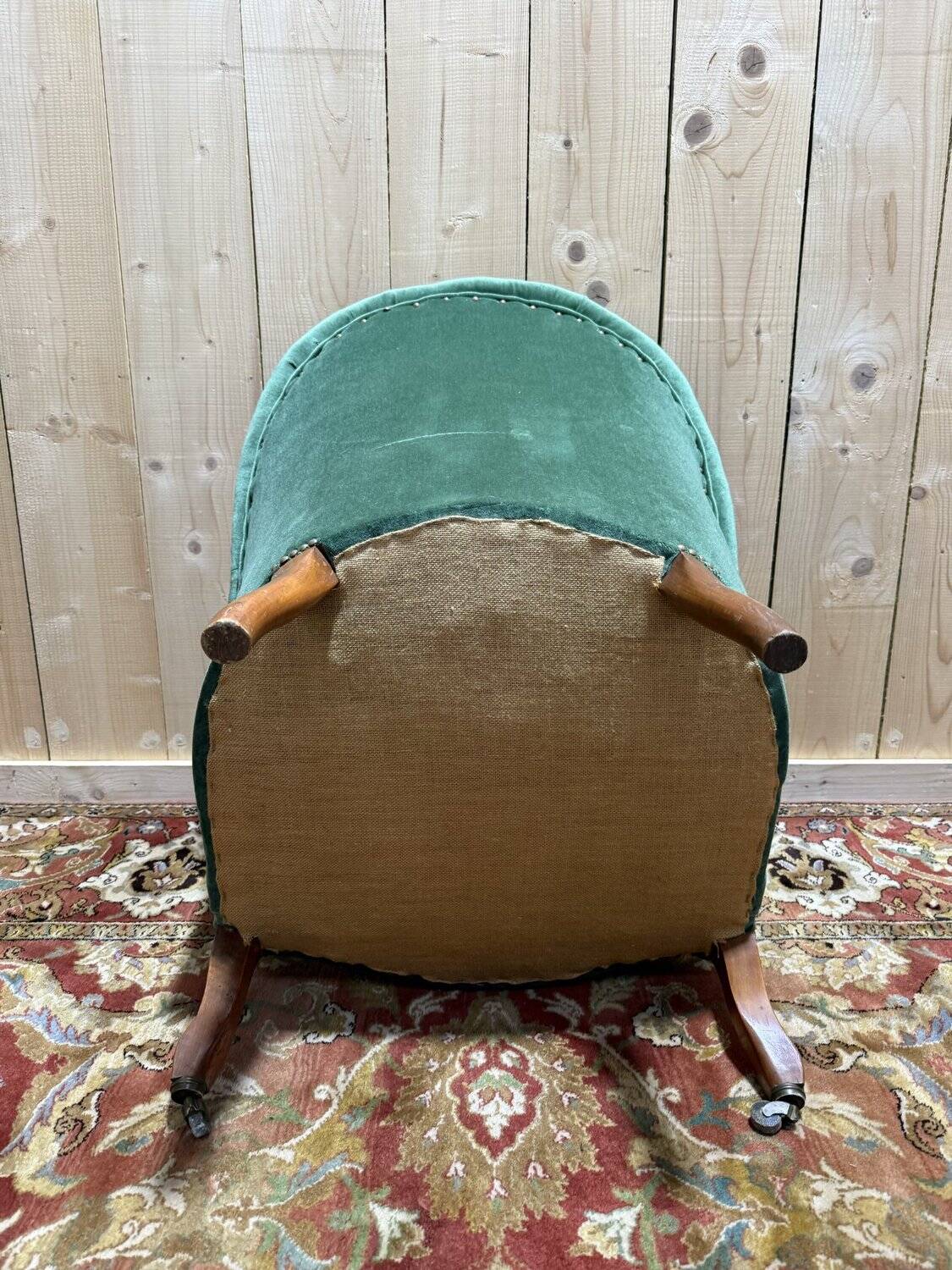 Napoleon III period crapaud armchair in green velvet.