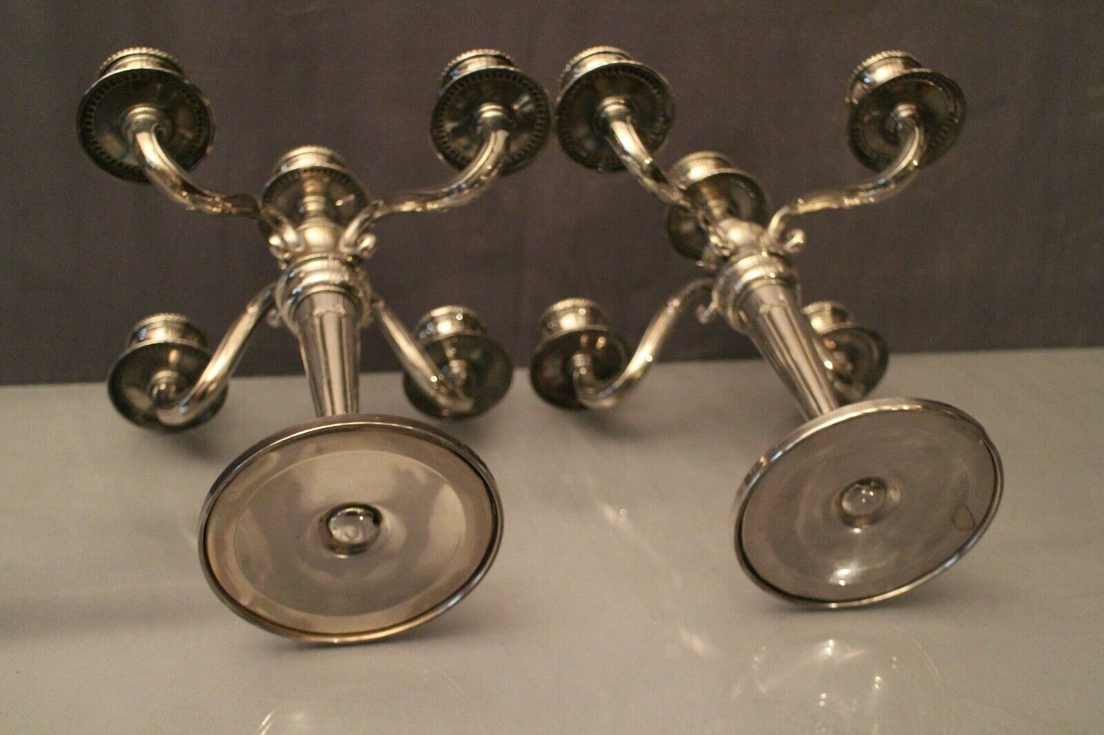 Pair of large candlesticks with 4 silver metal lights in Louis XVI style