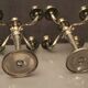 Pair of large candlesticks with 4 silver metal lights in Louis XVI style