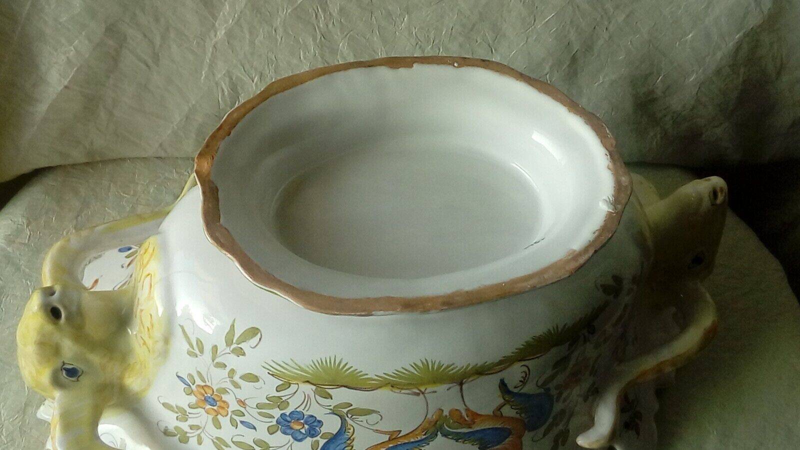 Moustiers earthenware planter with ram's head