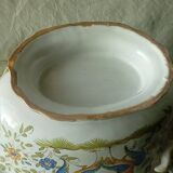 Moustiers earthenware planter with ram's head