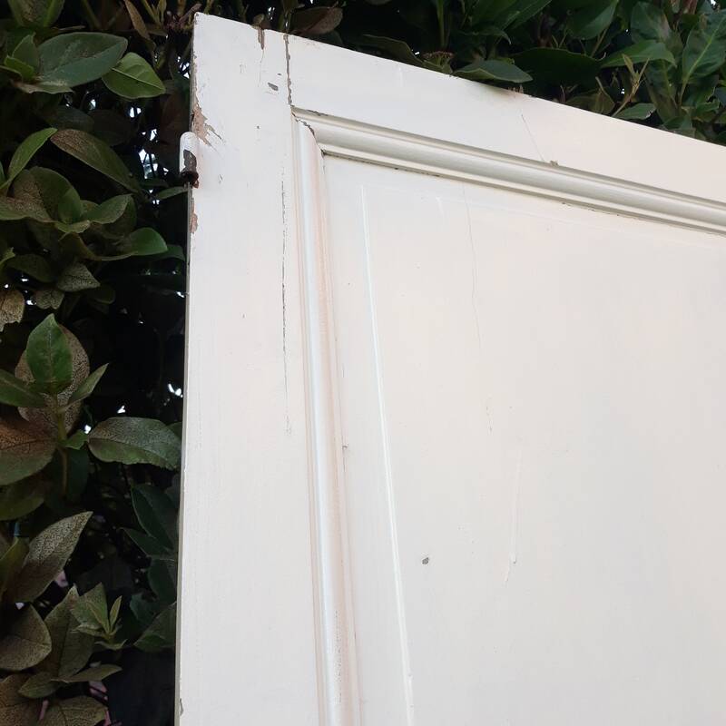 Communication door H220xW80.5cm, old panelled with moulding.