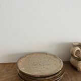 4 stoneware coffee cups and saucers
