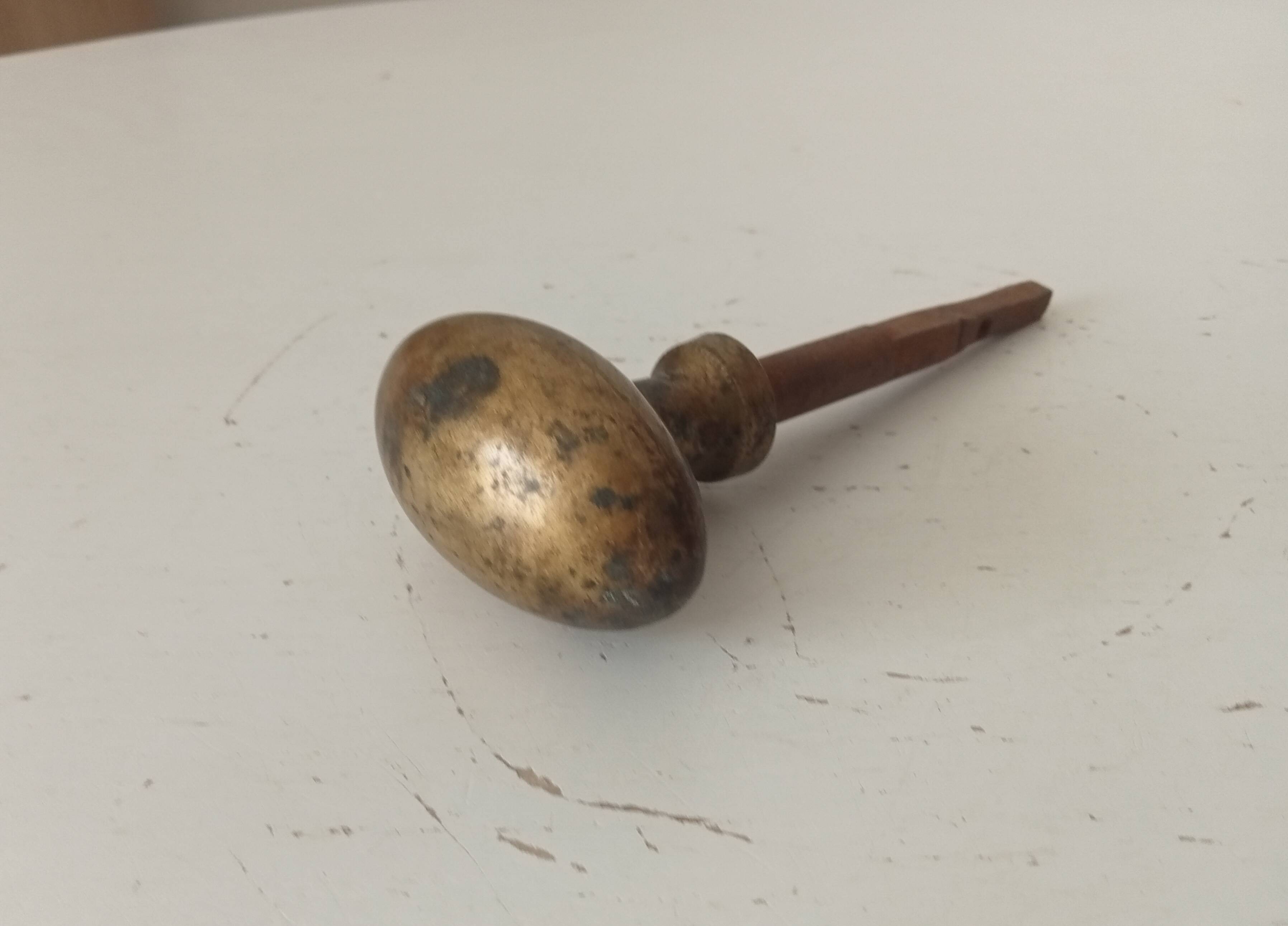 Antique olive door handle from the 19th century.