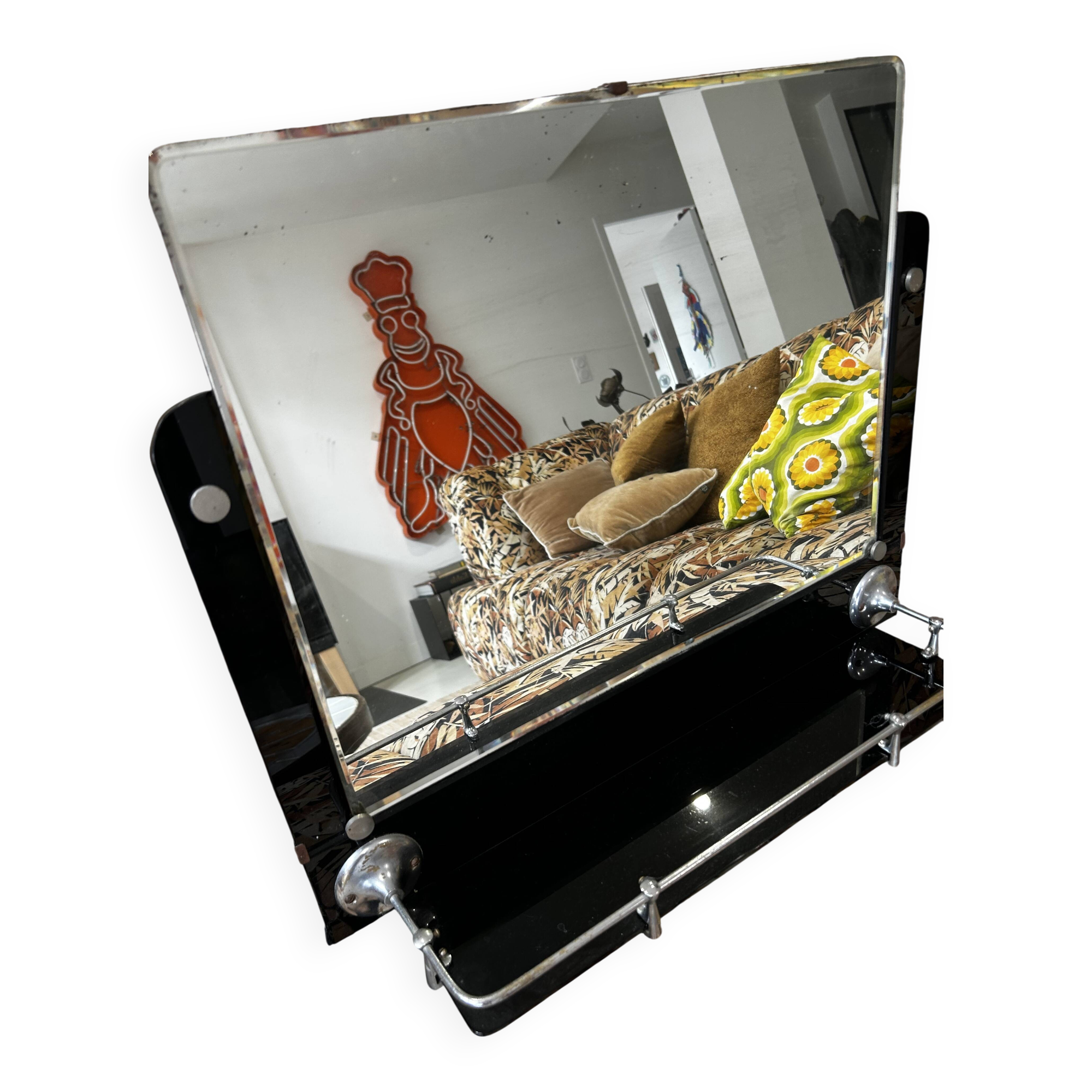 Vintage black mirror from the 1930s/40s with shelf.