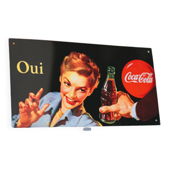 Old vintage Coca Cola advertising sign