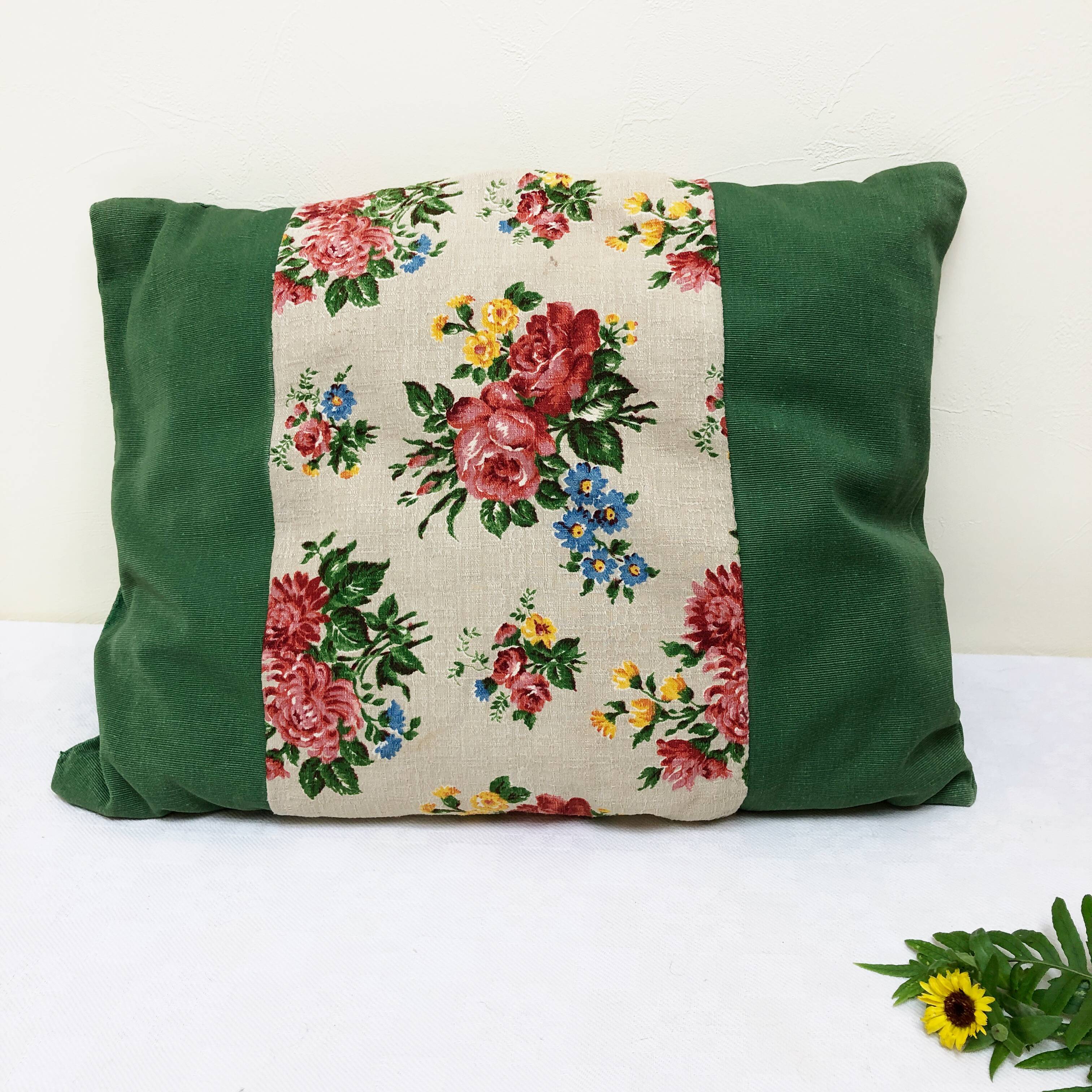 Green and flowery cushion