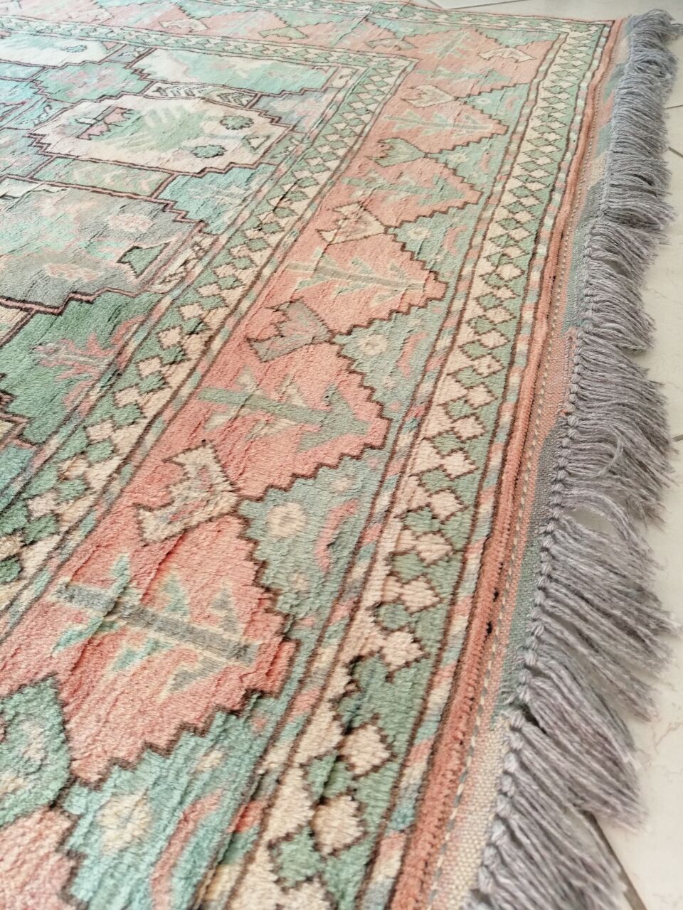 Afghan rug in pastel colors