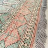 Afghan rug in pastel colors