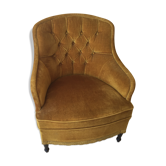 Fauteuil vintage capitonné en velours or