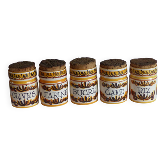 5 ceramic spice jars.