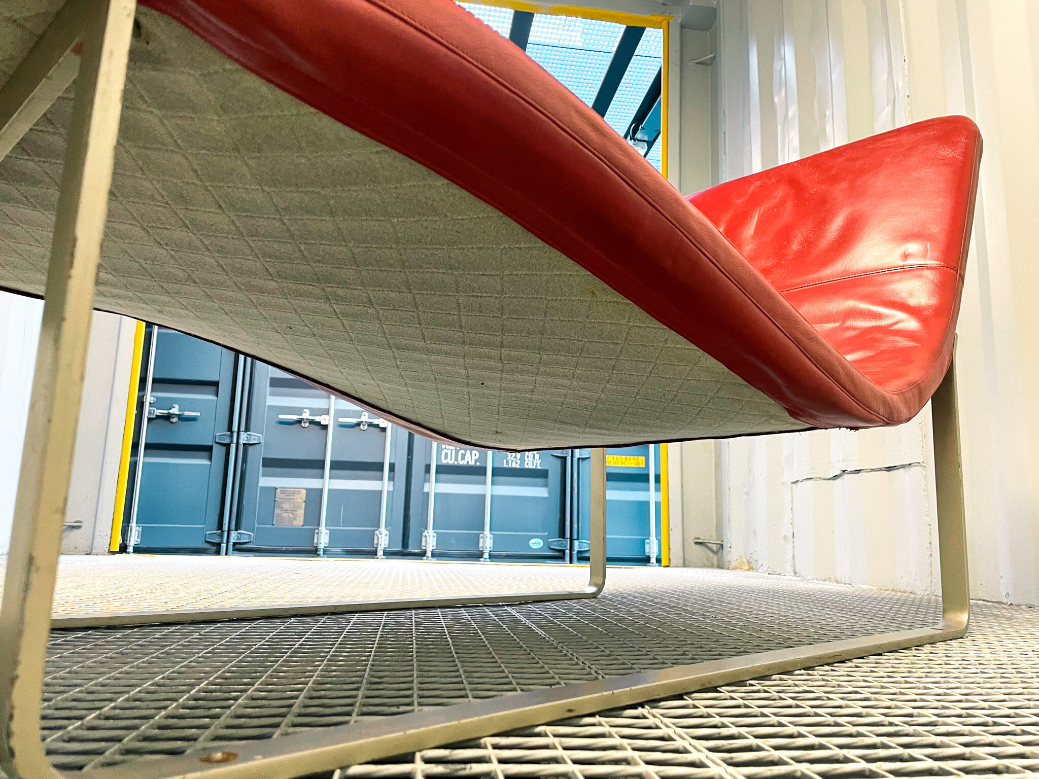 B&B Italia red leather lounge chair by Jeffrey Bernett