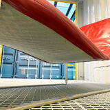 B&B Italia red leather lounge chair by Jeffrey Bernett