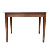 Raw wood farm table and white top