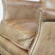 Fauteuil en cuir subtil avec coussin d'assise réversible en kilim