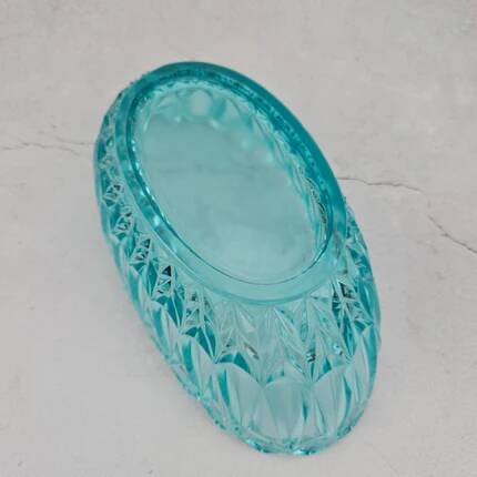 Vintage blue-green turquoise plate in cut and relief glass.