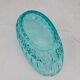Vintage blue-green turquoise plate in cut and relief glass.