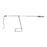 Large modular chrome lamp.