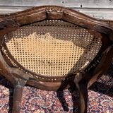 Pair of caned convertible armchairs Louis XV period