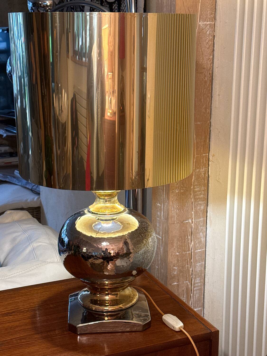 Beautiful ceramic base lamp with a golden metal shade.