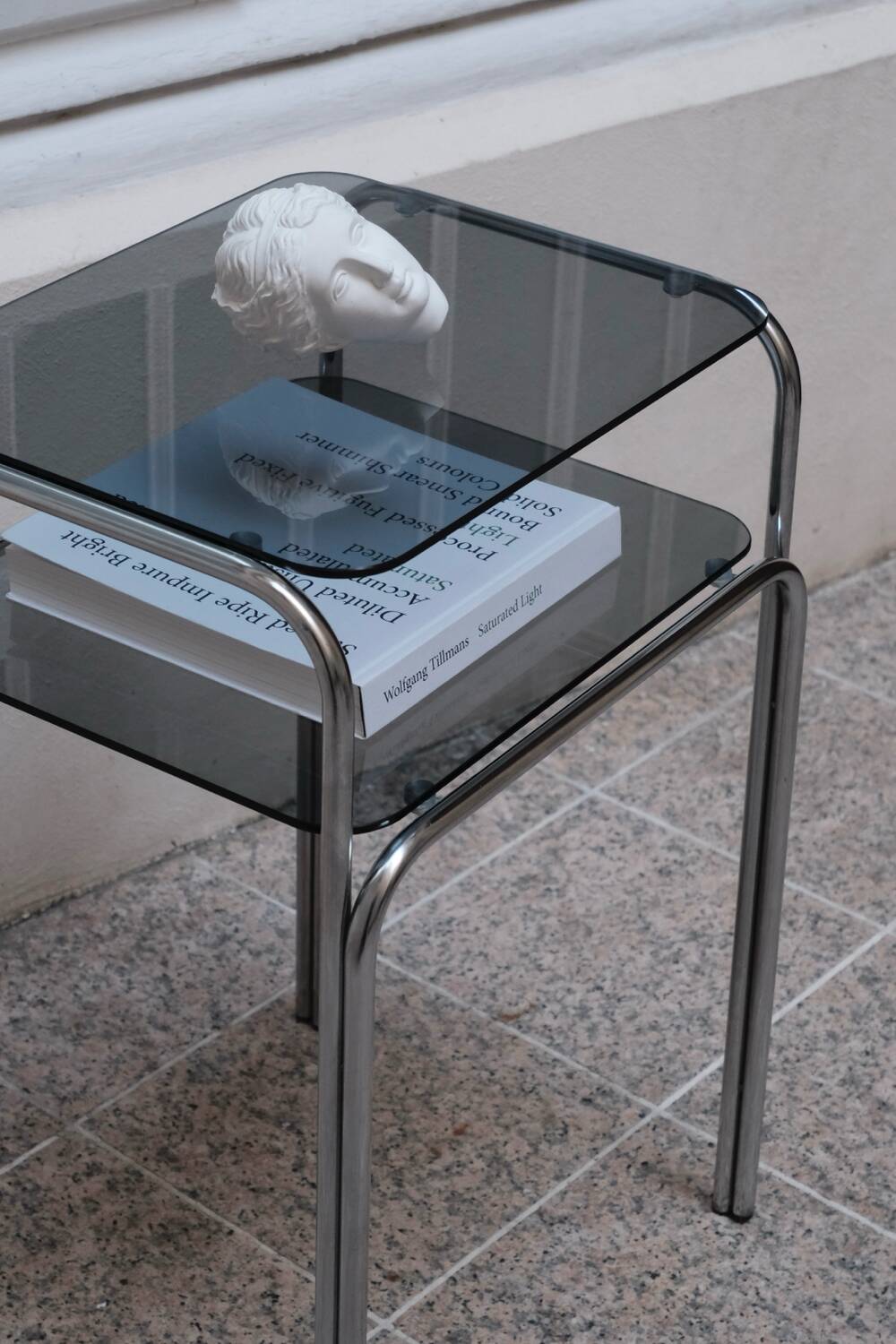 Vintage side table in smoked glass and chromed metal – 70s