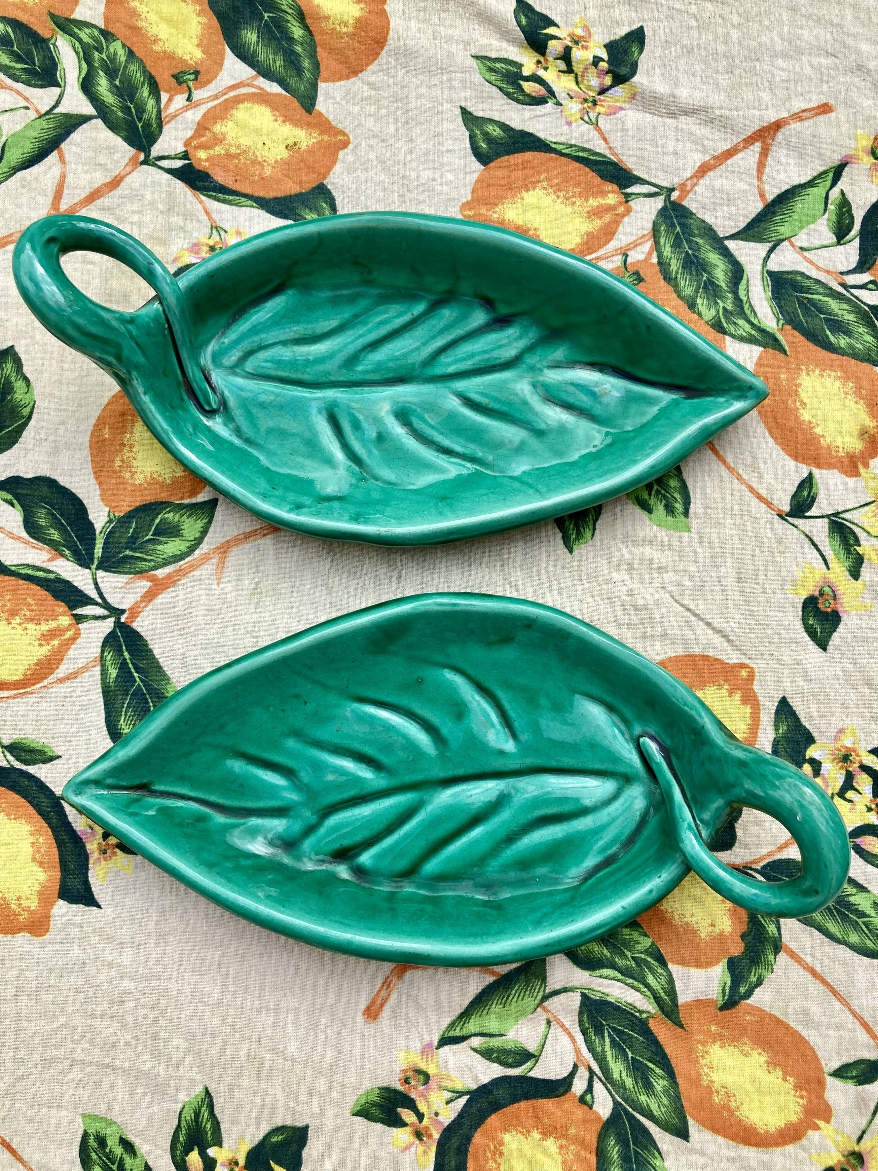 Duo of Vallauris raviers in the shape of green leaves signed Cérenne