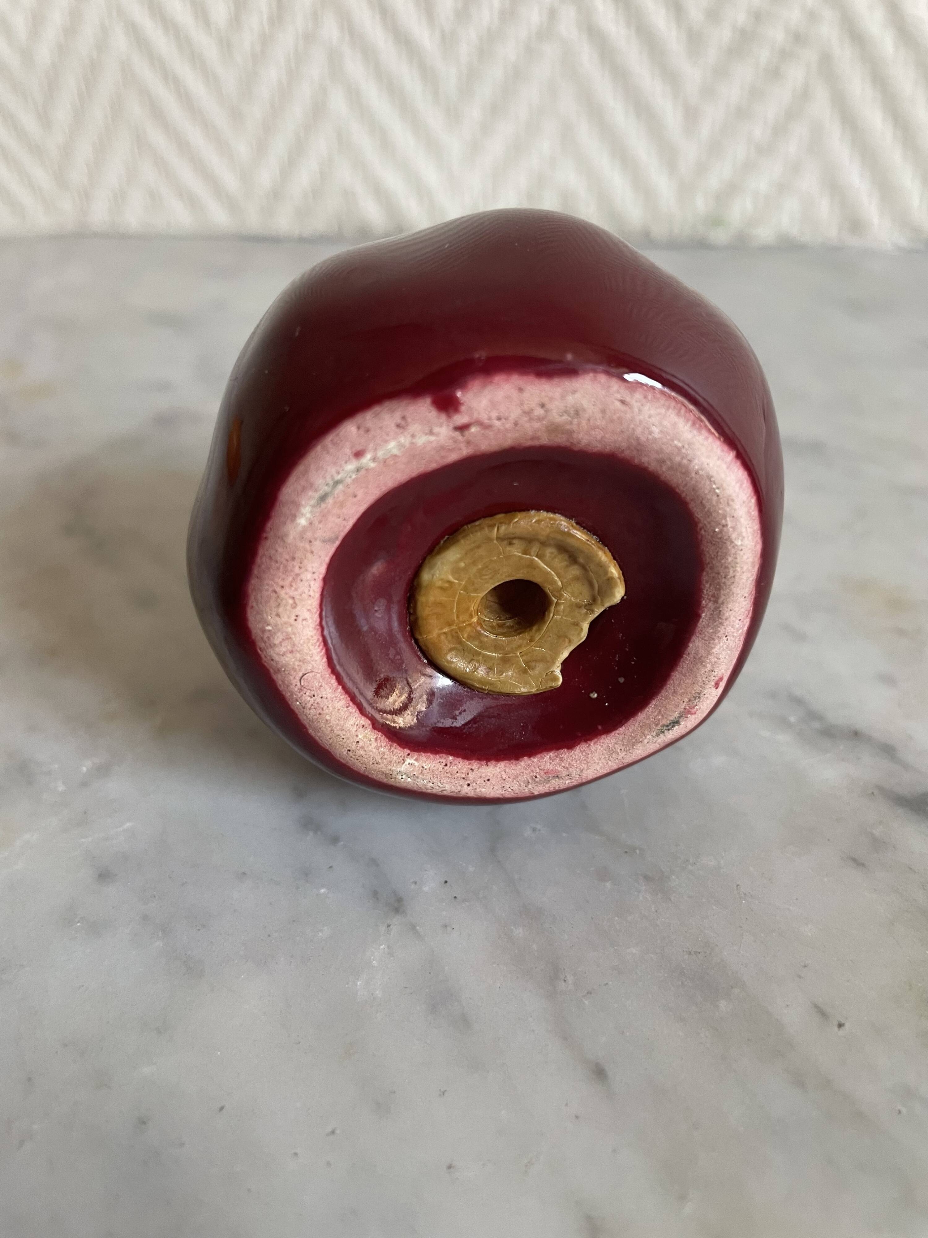 Set of ceramic salt and pepper shakers in the shape of a pumpkin tomato