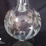 Wine carafe on foot, in cut and enameled glass