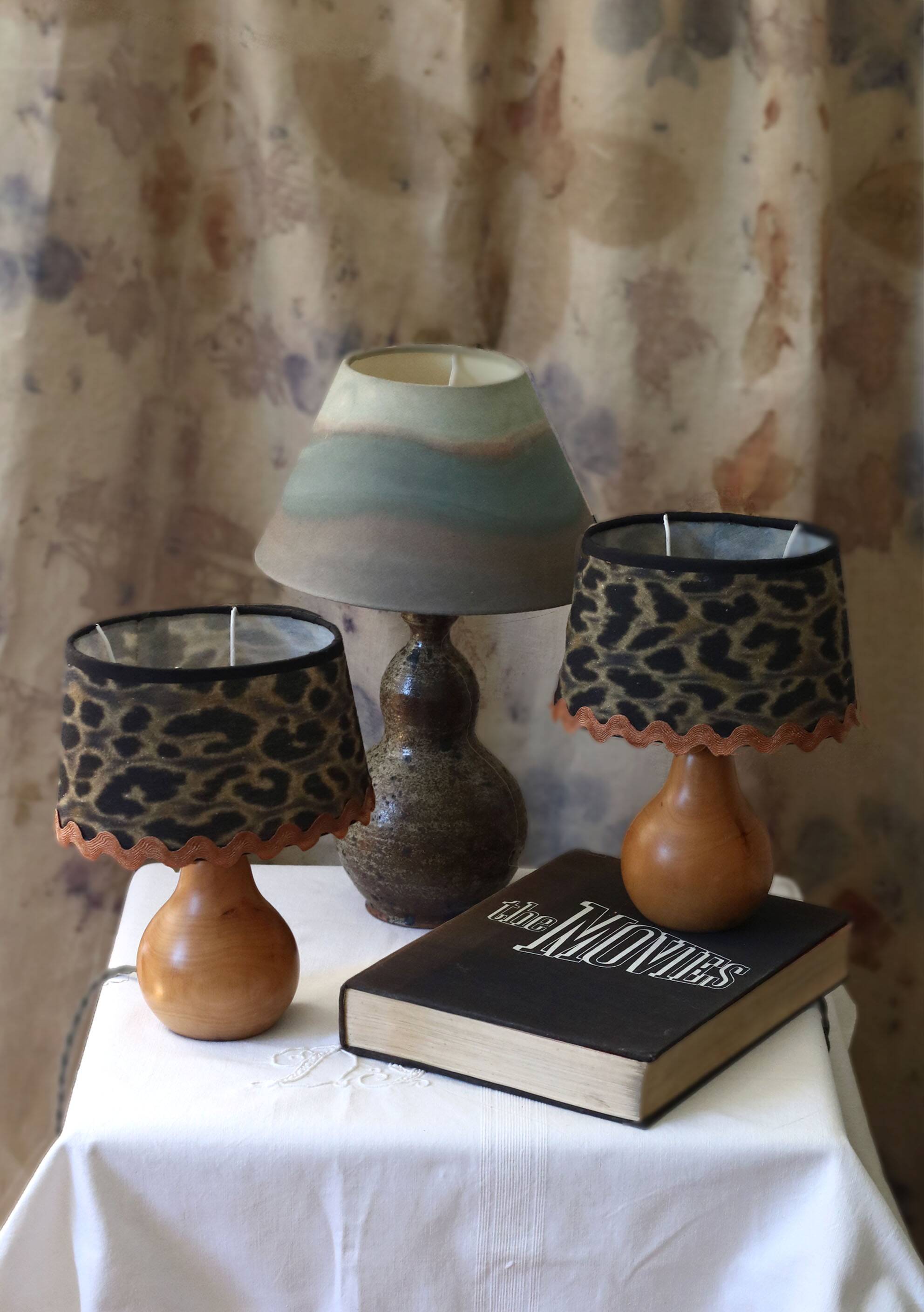 Pair of pear wood bedside lamps with leopard shades