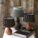 Pair of bedside lamps in pear wood with leopard shade.