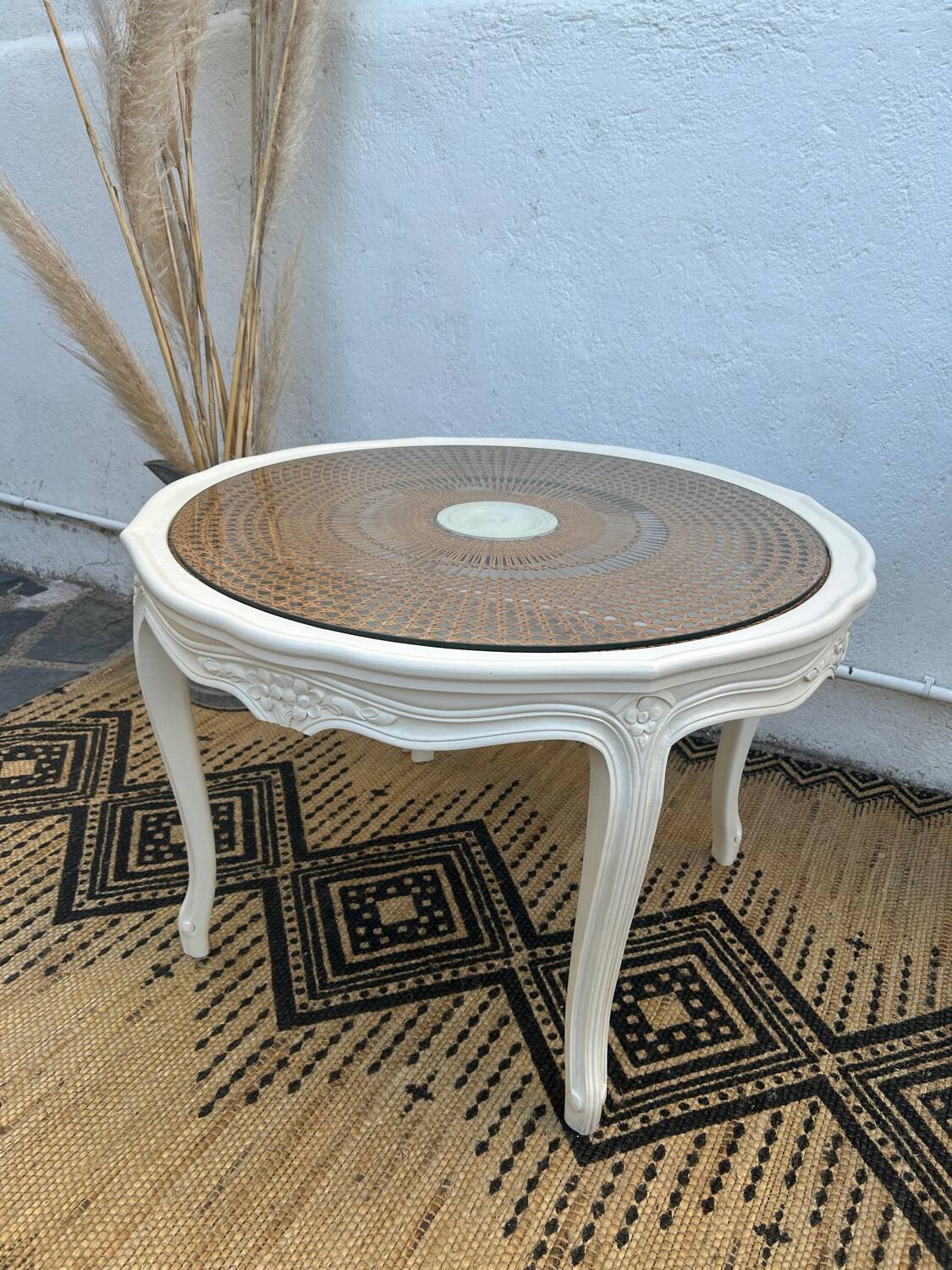 Round coffee table with cane
