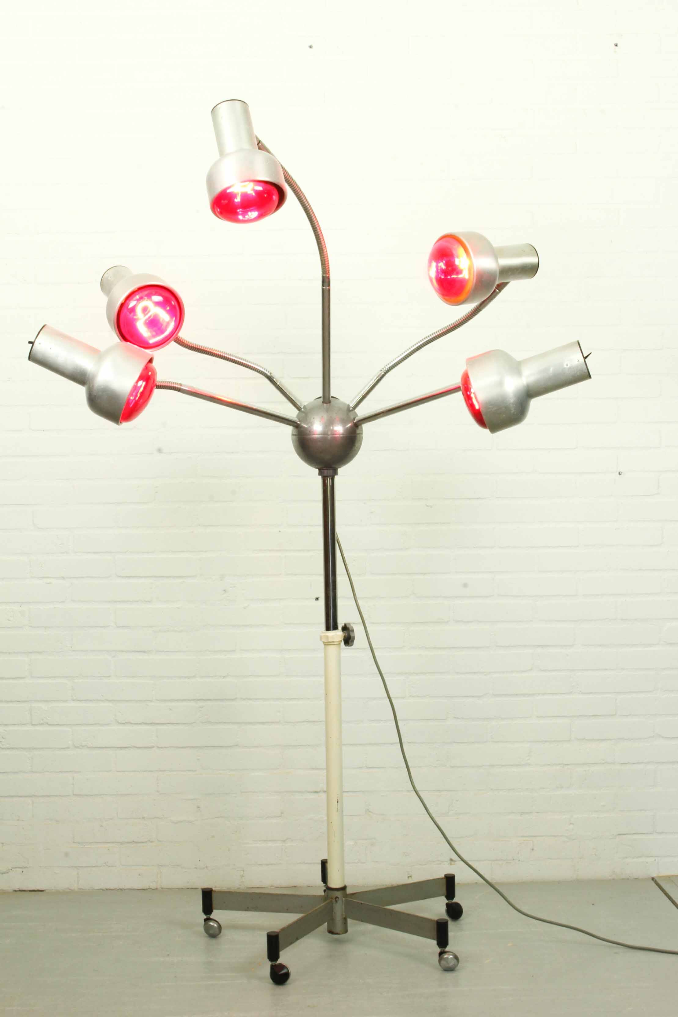 Chrome mid century modern adjustable five-arm lamp on wheel base