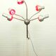 Chrome mid century modern adjustable five-arm lamp on wheel base