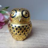 Old small black and gold lacquered wooden box in the shape of an owl