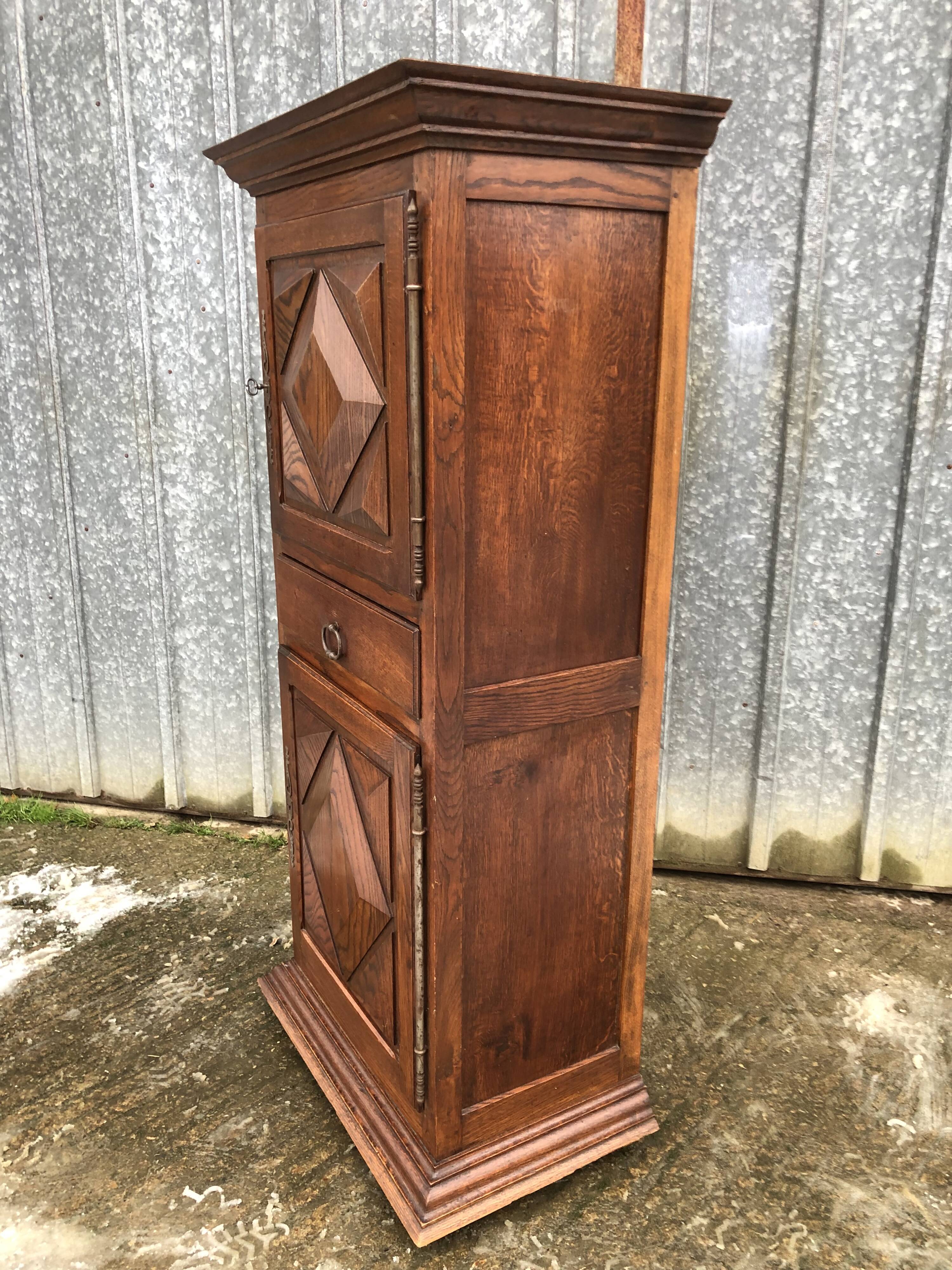 Solid oak wardrobe with 2 doors and 1 drawer in neo Louis XIII style.