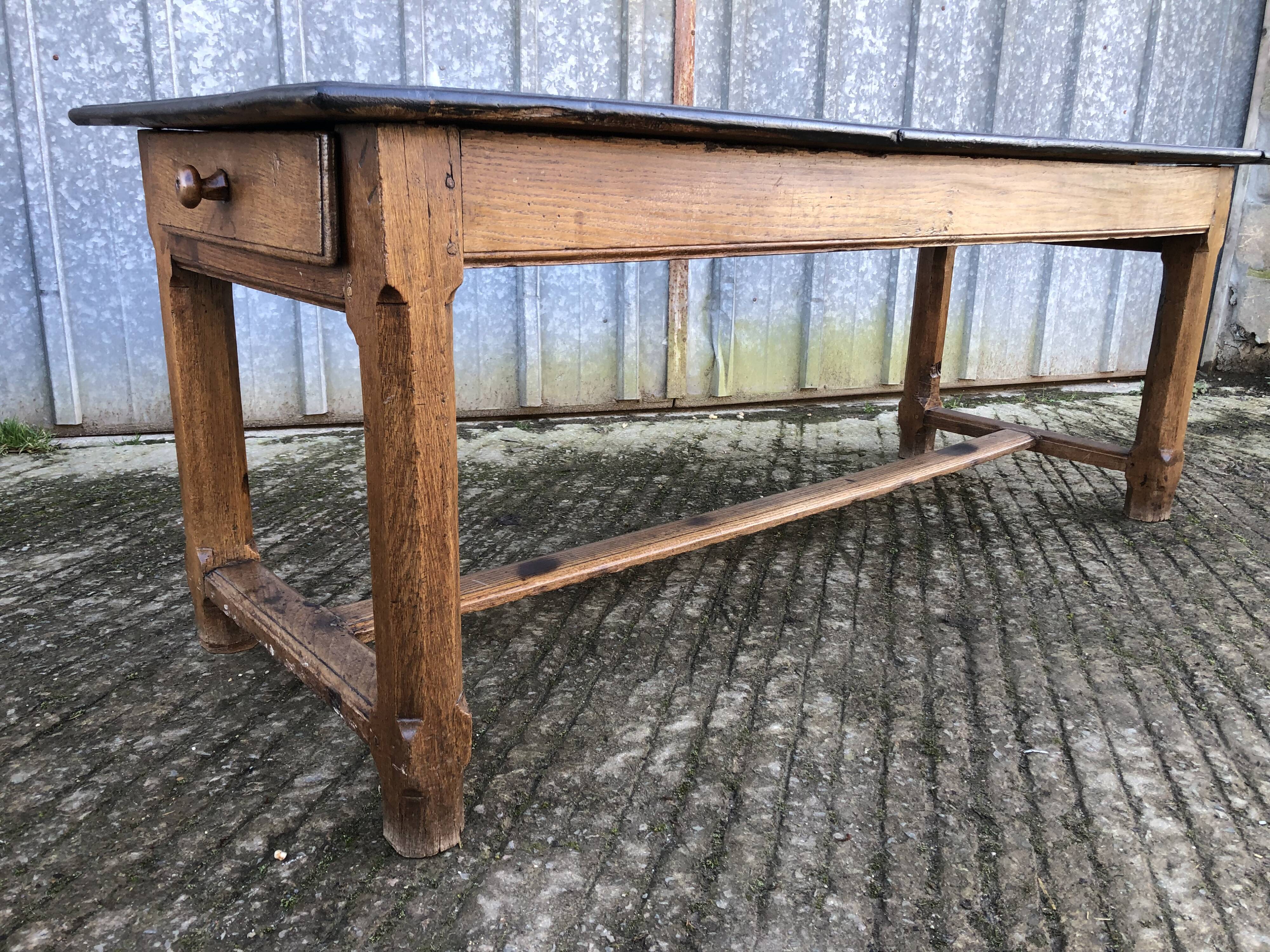Antique oak farmhouse table with cat bar and 2 end drawers