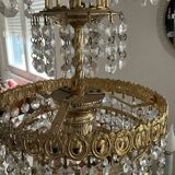 Cascade chandelier with crystal and brass tassels