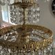 Cascade chandelier with crystal and brass tassels
