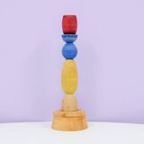 multi colored wooden candlestick