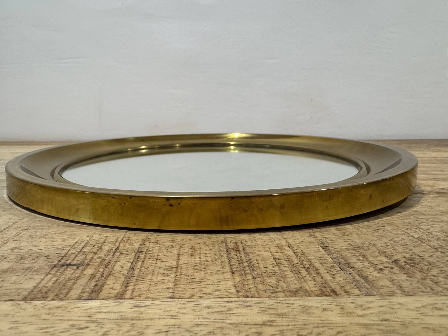 Golden round mirror