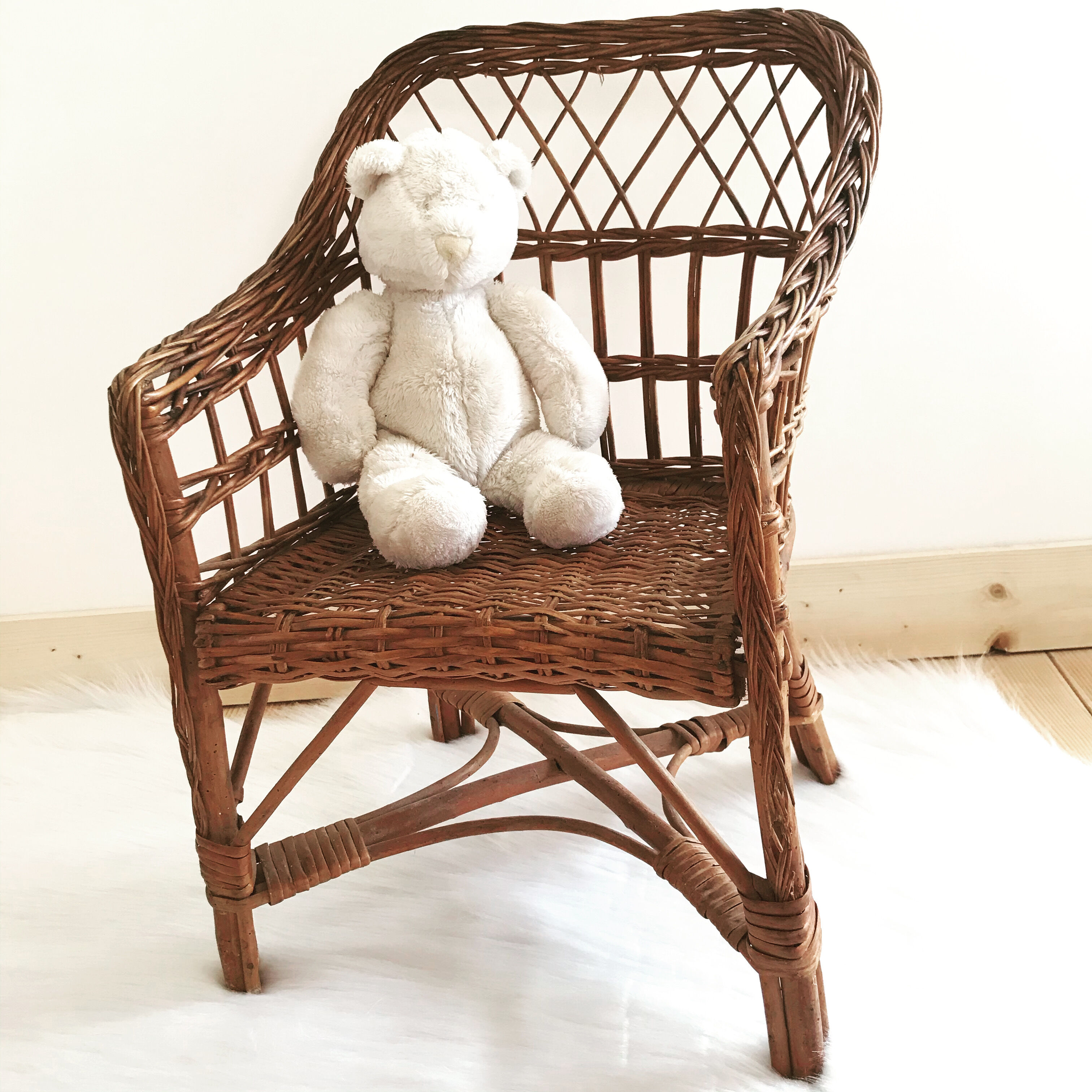 Vintage wicker children's armchair