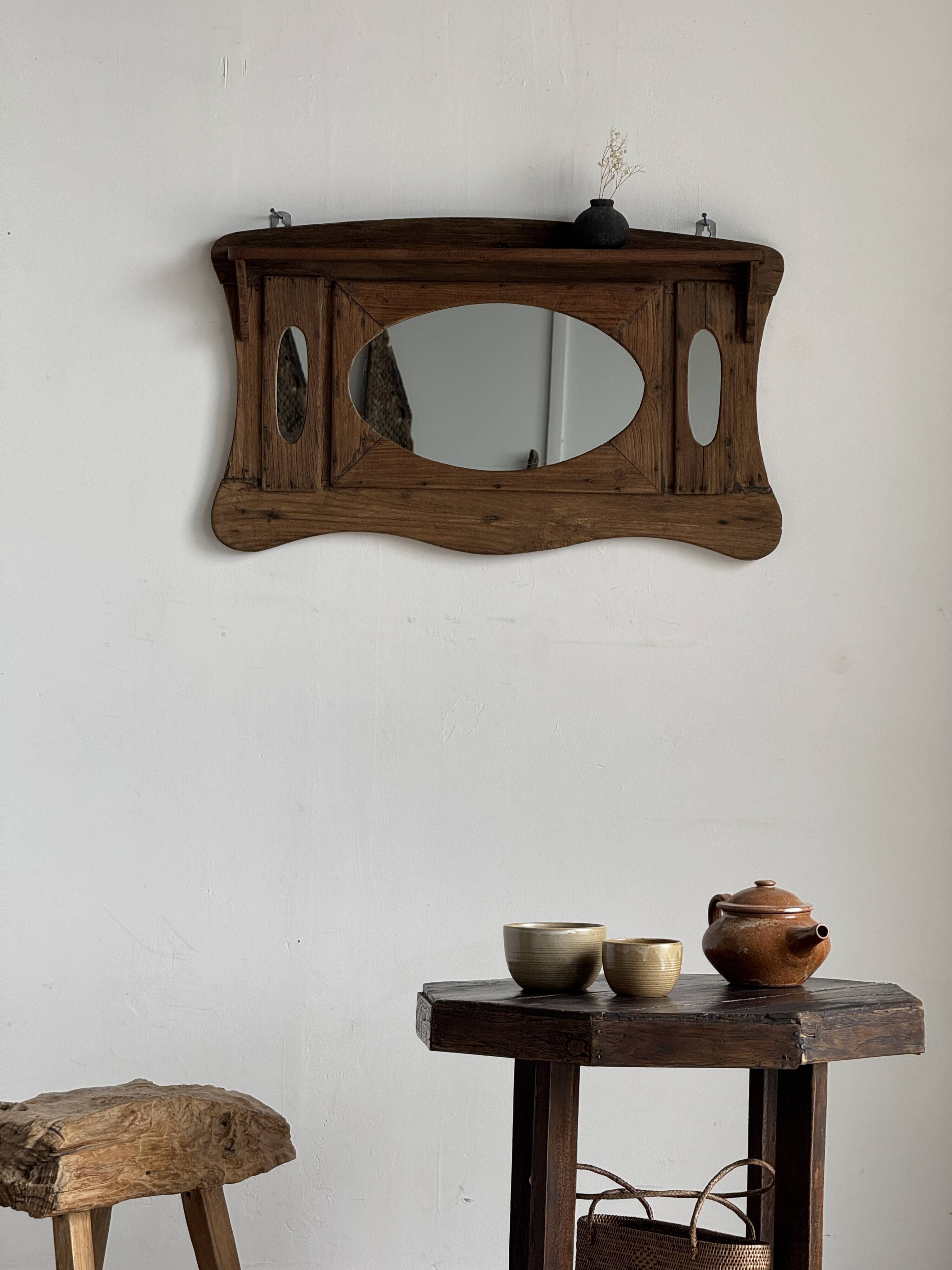 Small wall mirror in organic old Indonesian teak 75x45.