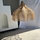 Rattan pendant lamp in the shape of a flower